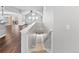 Spacious living room featuring hardwood floors, high ceilings, and abundant natural light at 7560 S Biloxi Ct, Aurora, CO 80016