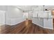 Open floor plan features hardwood floors, modern design, and neutral colors at 7560 S Biloxi Ct, Aurora, CO 80016