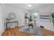 Bright home office featuring hardwood floors, neutral colors, and natural light at 6755 W 45Th Ave, Wheat Ridge, CO 80033