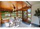 Charming sun room with wood paneled ceiling and an abundance of windows at 6755 W 45Th Ave, Wheat Ridge, CO 80033