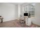 Bright home office with modern desk, comfortable chair, and a large window for natural light at 14818 Dahlia St, Thornton, CO 80602