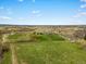 Aerial view of green land and community at 13041 Reata Ridge Dr, Parker, CO 80134