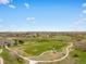 Aerial view of community park with sports fields, walking paths, and green spaces at 13041 Reata Ridge Dr, Parker, CO 80134