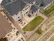 Aerial view of backyard with patio, grass, and surrounding landscape at 13041 Reata Ridge Dr, Parker, CO 80134