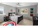 Cheerful bedroom featuring a ceiling fan and ample natural light at 13041 Reata Ridge Dr, Parker, CO 80134