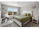 ' room with natural light from a large window, featuring a bed and dinosaur themed decor at 13041 Reata Ridge Dr, Parker, CO 80134