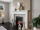 Inviting fireplace with stone surround and stylish decor at 13041 Reata Ridge Dr, Parker, CO 80134