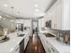 Open concept kitchen with a large island and stainless steel appliances at 13041 Reata Ridge Dr, Parker, CO 80134