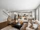 Open-concept living room and kitchen area, perfect for entertaining and gatherings at 13041 Reata Ridge Dr, Parker, CO 80134