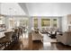 Open-concept living room and kitchen area, perfect for entertaining and gatherings at 13041 Reata Ridge Dr, Parker, CO 80134