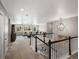 Spacious upstairs living area with plush carpet and backyard view at 13041 Reata Ridge Dr, Parker, CO 80134