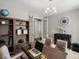 Bright office with custom shelving and french doors at 13041 Reata Ridge Dr, Parker, CO 80134