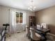 Comfortable home office with natural light and backyard view at 13041 Reata Ridge Dr, Parker, CO 80134