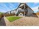 A well-maintained backyard with a deck and stairs leading to the upper level creates an inviting outdoor space at 1388 Castle Creek Cir, Castle Rock, CO 80104