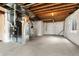 Spacious unfinished basement with essential systems, offering a blank canvas for customization at 1388 Castle Creek Cir, Castle Rock, CO 80104