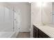 Bathroom with glass enclosed shower and sink with cabinet at 1388 Castle Creek Cir, Castle Rock, CO 80104