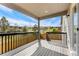 This outdoor deck provides an excellent vantage point to enjoy green spaces and the surrounding neighborhood at 1388 Castle Creek Cir, Castle Rock, CO 80104