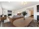 Cozy living room featuring fireplace and wood floors at 1388 Castle Creek Cir, Castle Rock, CO 80104