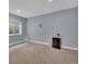 Bedroom with blue-gray walls, a window and an area rug at 413 N De Gaulle Ct, Aurora, CO 80018