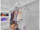 Walk-in closet with shelving, hanging clothes, and storage at 413 N De Gaulle Ct, Aurora, CO 80018