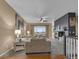 Spacious living room showcasing a fireplace, stylish furniture, and an inviting atmosphere with lots of natural light at 413 N De Gaulle Ct, Aurora, CO 80018
