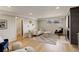 Stylish lower level living room featuring a fireplace, recessed lighting and hardwood floors at 2641 S Magnolia St, Denver, CO 80224