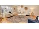 Bright living room with hardwood floors, stylish furniture, and neutral decor at 2641 S Magnolia St, Denver, CO 80224
