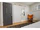 Main bedroom features a gray door that opens to a main bathroom at 2641 S Magnolia St, Denver, CO 80224