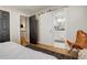 Main bedroom offers a stylish sliding door that opens to a main bathroom at 2641 S Magnolia St, Denver, CO 80224