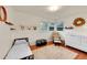 Bright bedroom with hardwood floors features a twin bed and Bedroom furniture at 1241 Wabash St, Denver, CO 80220