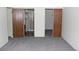 A bedroom featuring a full bathroom and lots of closet space at 13952 E Marina Dr # 304, Aurora, CO 80014