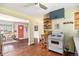 Charming kitchen with hardwood floors and plenty of natural light at 1666 S Bryant St, Denver, CO 80219