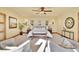 Main bedroom with seating area and large artwork at 6057 Red Hill Rd, Boulder, CO 80302