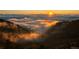 Beautiful sunrise view of clouds over the landscape, offering a serene and picturesque setting at 6057 Red Hill Rd, Boulder, CO 80302