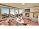 Living room with stone fireplace and cloud views at 6057 Red Hill Rd, Boulder, CO 80302