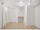 Finished basement featuring tile flooring, a built in desk, a door, and natural light at 1580 Quince St, Denver, CO 80220