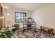 This office offers a desk, chair, lamp, natural light and is well-decorated at 25875 Buffalo Ln, Golden, CO 80401