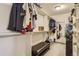 This walk-in closet offers shelves, hanging rods and ample storage space at 25875 Buffalo Ln, Golden, CO 80401
