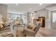 Cozy living room with hardwood floors, modern furniture, and open floor plan at 8982 Delacorte St, Littleton, CO 80129