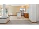 Basement featuring carpet and a bar with sink and wooden cabinets at 6668 Fairways Dr, Longmont, CO 80503