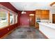 Stylish kitchen features wood cabinets, stainless appliances, and tile flooring near an eat-in area at 6668 Fairways Dr, Longmont, CO 80503