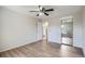 Bedroom boasts laminate flooring and a closet with mirrored doors at 10150 E Virginia Ave # 301, Denver, CO 80247
