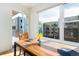 Balcony with expansive windows and lovely neighborhood view with another apartment buildings at 3701 Arapahoe Ave # 318, Boulder, CO 80303