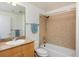Cozy bathroom features a shower-tub combo with a modern vanity at 3701 Arapahoe Ave # 318, Boulder, CO 80303