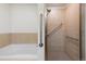 Clean bathroom featuring a shower, bathtub, and neutral tile at 3701 Arapahoe Ave # 318, Boulder, CO 80303