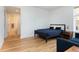 Cozy bedroom with ensuite bathroom, comfortable bed, and modern accents at 3701 Arapahoe Ave # 318, Boulder, CO 80303