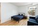 Inviting bedroom provides a comfortable bed, stylish nightstand, and an outdoor view at 3701 Arapahoe Ave # 318, Boulder, CO 80303