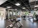 Well-equipped fitness center featuring weight machines, cardio equipment, and mirrored walls at 3701 Arapahoe Ave # 318, Boulder, CO 80303