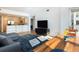 Open concept floor plan boasts a modern kitchen with stainless steel appliances and spacious living area at 3701 Arapahoe Ave # 318, Boulder, CO 80303