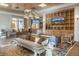 Inviting lounge with comfortable seating and a large bookshelf at 3701 Arapahoe Ave # 318, Boulder, CO 80303